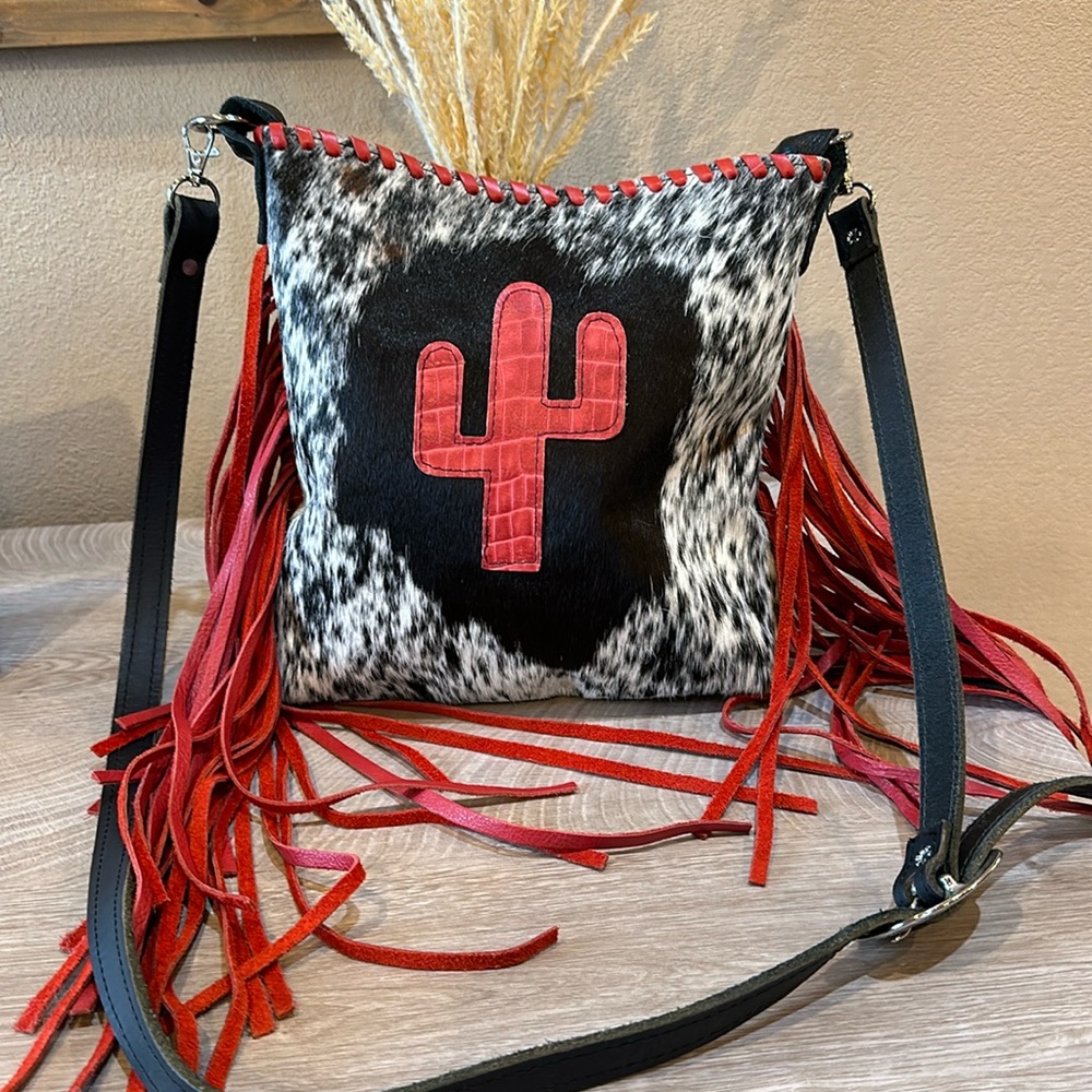 Cowhide and fringe bag